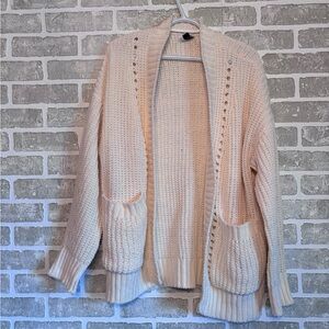 Cream colored cardigan. Soft, comfortable, Barely worn. American eagle.